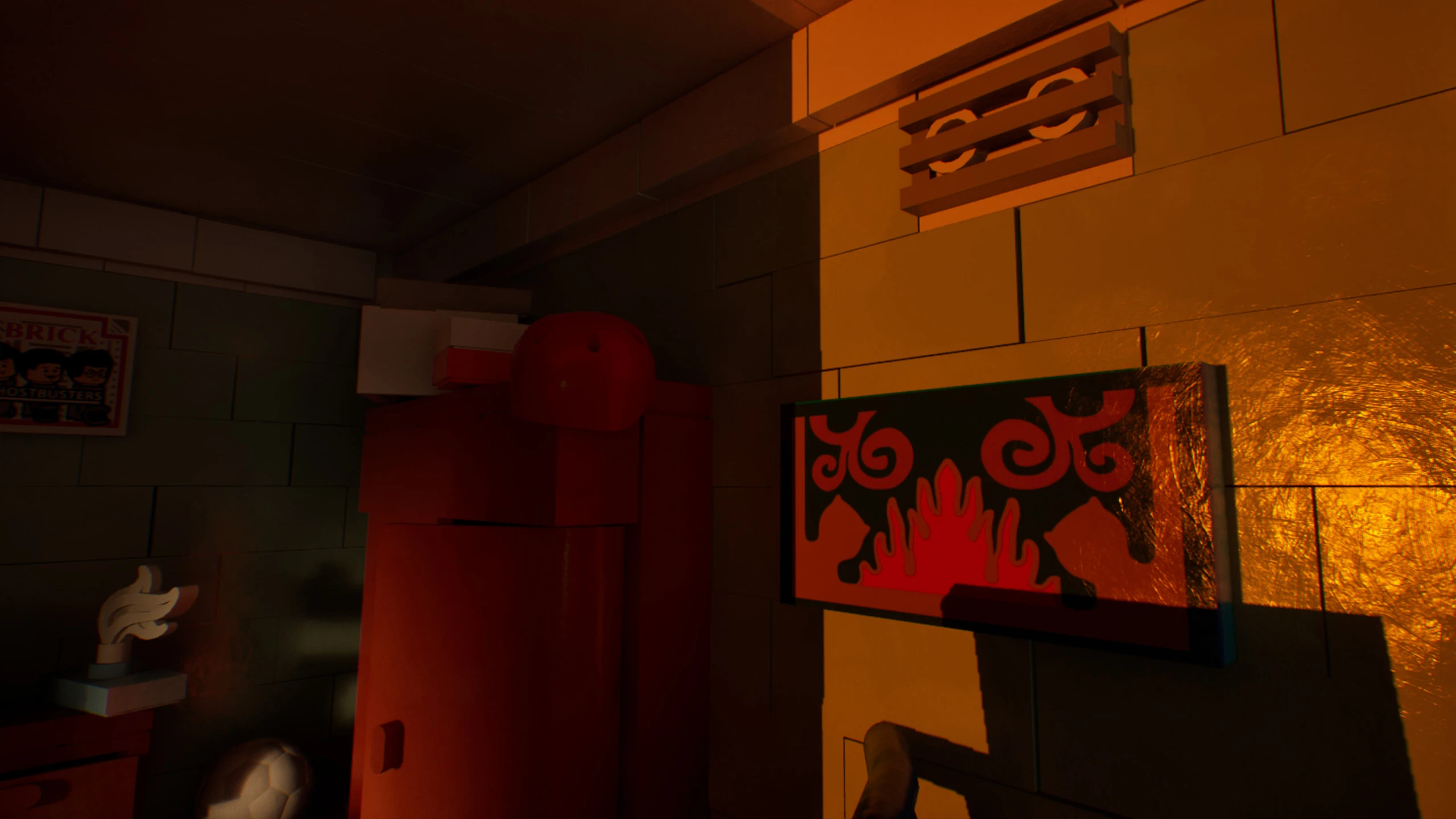 Looking up at the corner of the room, a red wardrobe with a round red shape on top, a patterned red and black poster lit gold on the wall, and a small white ornament on the bedside table
