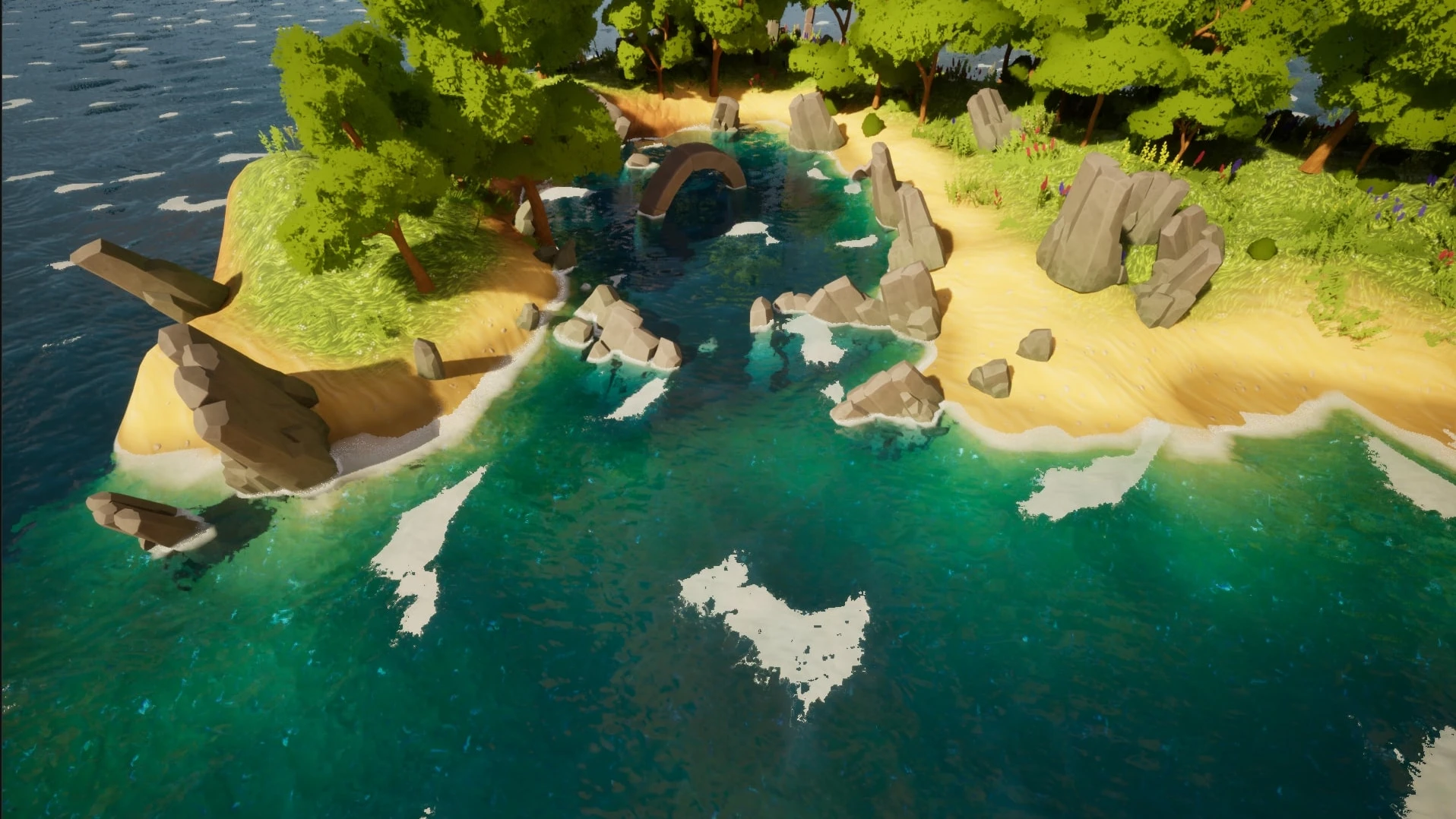 A high angle view of a sheltered cove, green water flecked with white foam patches, rocks and a stone arch standing in the shallows