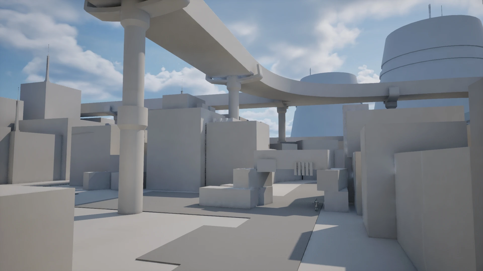 The start straight in the grey blockout on 12 March: plain boxes and cylinders under the highway overpass, with a blue sky