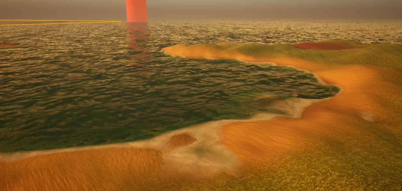A curved sandy shoreline at golden hour, with a soft band of pale foam along the water's edge fading out into the sea