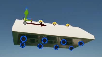 A white slope brick in Unreal with a move gizmo, yellow handles on its top studs and blue rings on the anti-studs underneath